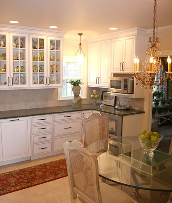 white kitchen with dark countertops