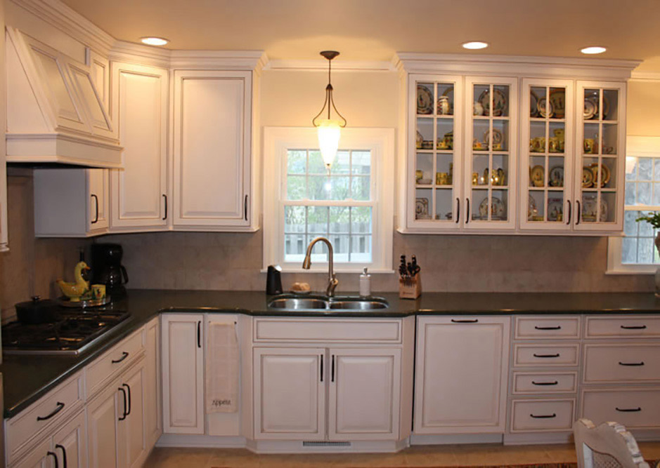 white kitchen with pendant over the sink