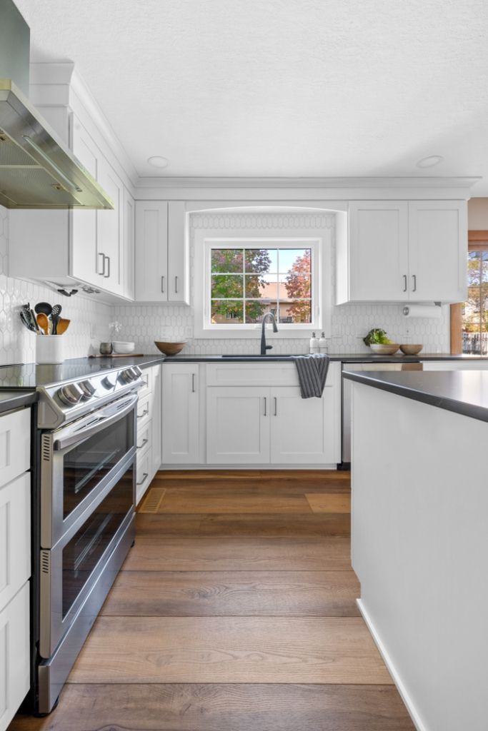 An example of kitchen remodeling- Transitional Style Kitchen With White Cabinets